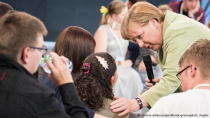 The Residence Permit: Syrians Praise "Compassionate Mother Merkel" The Residence Permit: Syrians Praise "Compassionate Mother Merkel"