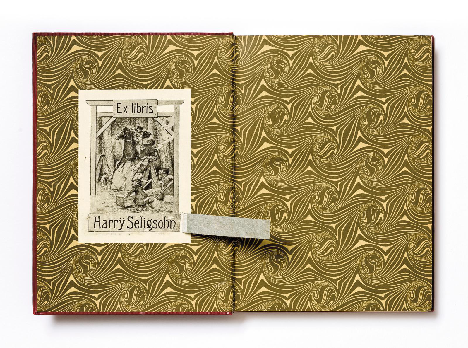 Harrÿ Seligsohn's ex-libris and a strip of paper concealing his name, removed in 2020 during identification work on plundered books. Book: Karl Voll, Memling: Des Meisters Gemälde in 197 Abbildungen, Stuttgart, Leipzig, 1909. Paris, INHA library, BCMN collection, 4 D 0229 (14). The book entered the BCMN collections through a donation by France's National Museums department in 1946. Harrÿ Seligsohn's ex-libris and a strip of paper concealing his name, removed in 2020 during identification work on plundered books. Book: Karl Voll, Memling: Des Meisters Gemälde in 197 Abbildungen, Stuttgart, Leipzig, 1909. Paris, INHA library, BCMN collection, 4 D 0229 (14). The book entered the BCMN collections through a donation by France's National Museums department in 1946.