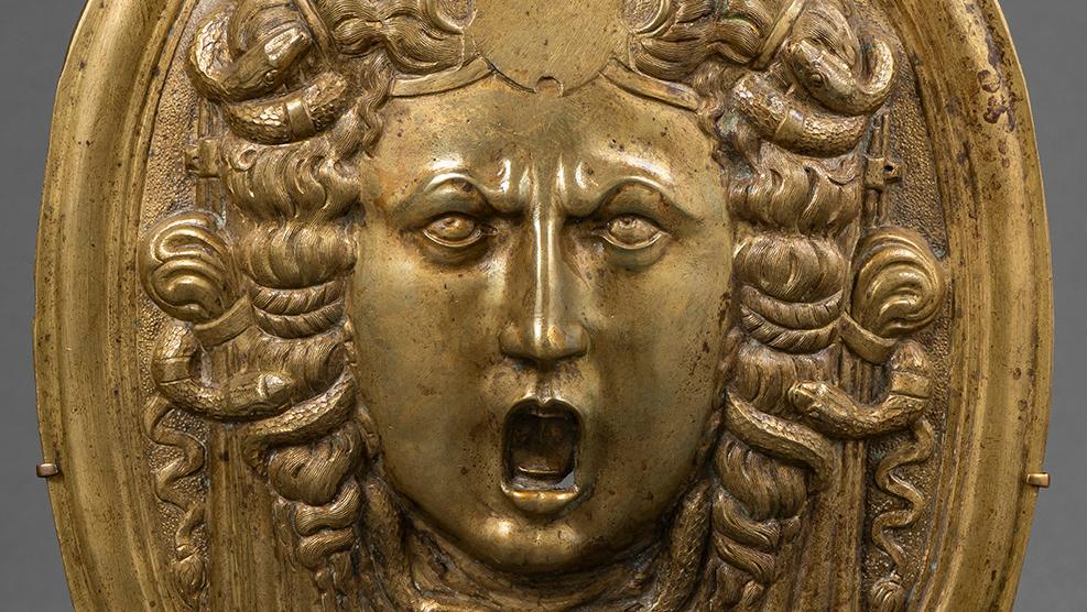 Northern Italy (Milan?), oval plaque on a ceremonial shield depicting Medusa, second half of the 16th century, bronze with very slight traces of gilding. © Christophe Fouin/Galerie Sismann Northern Italy (Milan?), oval plaque on a ceremonial shield depicting Medusa, second half of the 16th century, bronze with very slight traces of gilding. © Christophe Fouin/Galerie Sismann