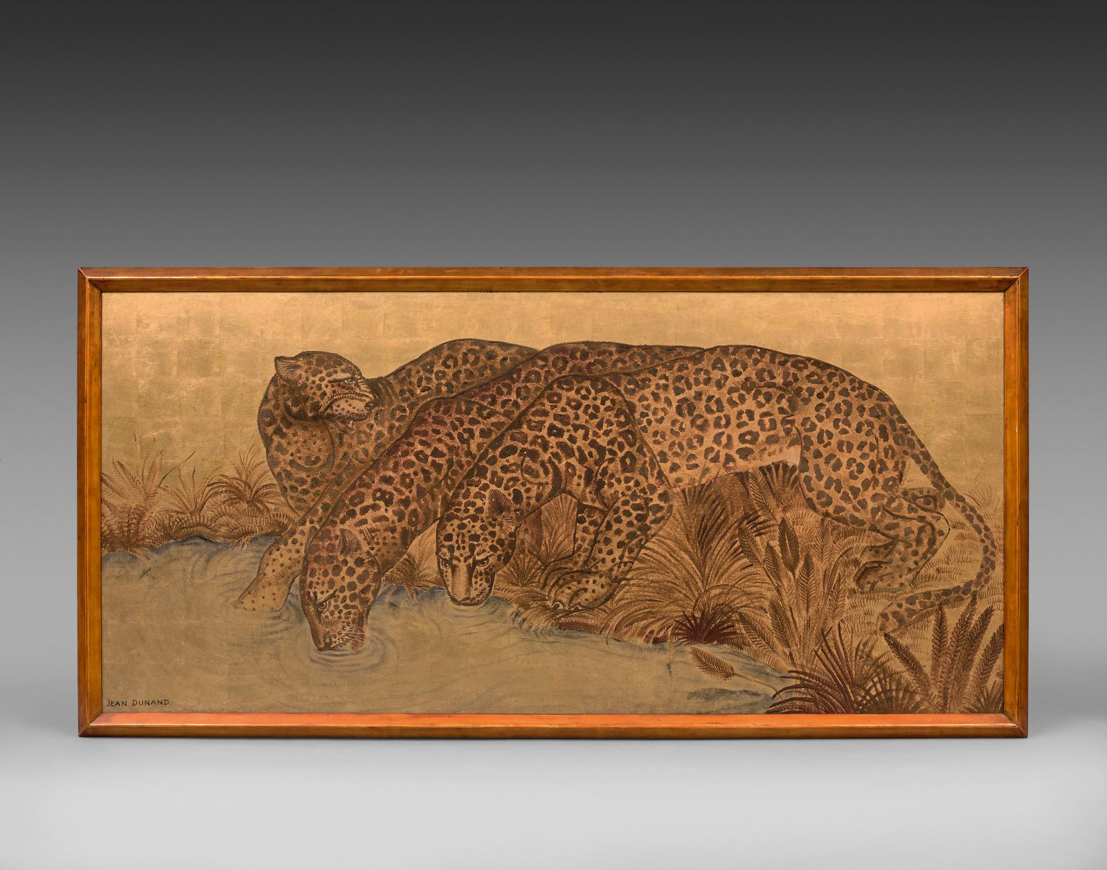Jean Dunand (1877-1942), Trois léopards s’abreuvant (Three Leopards Drinking), c. 1930, panel in brown and blue lacquer on a plain gold leaf background, original frame in fawn lacquer, 78 x 166 cm/30.7 x 65.4 in (87 x 175 cm/34.3 x 68.9 in with frame). Estimate: €60,000/80,000