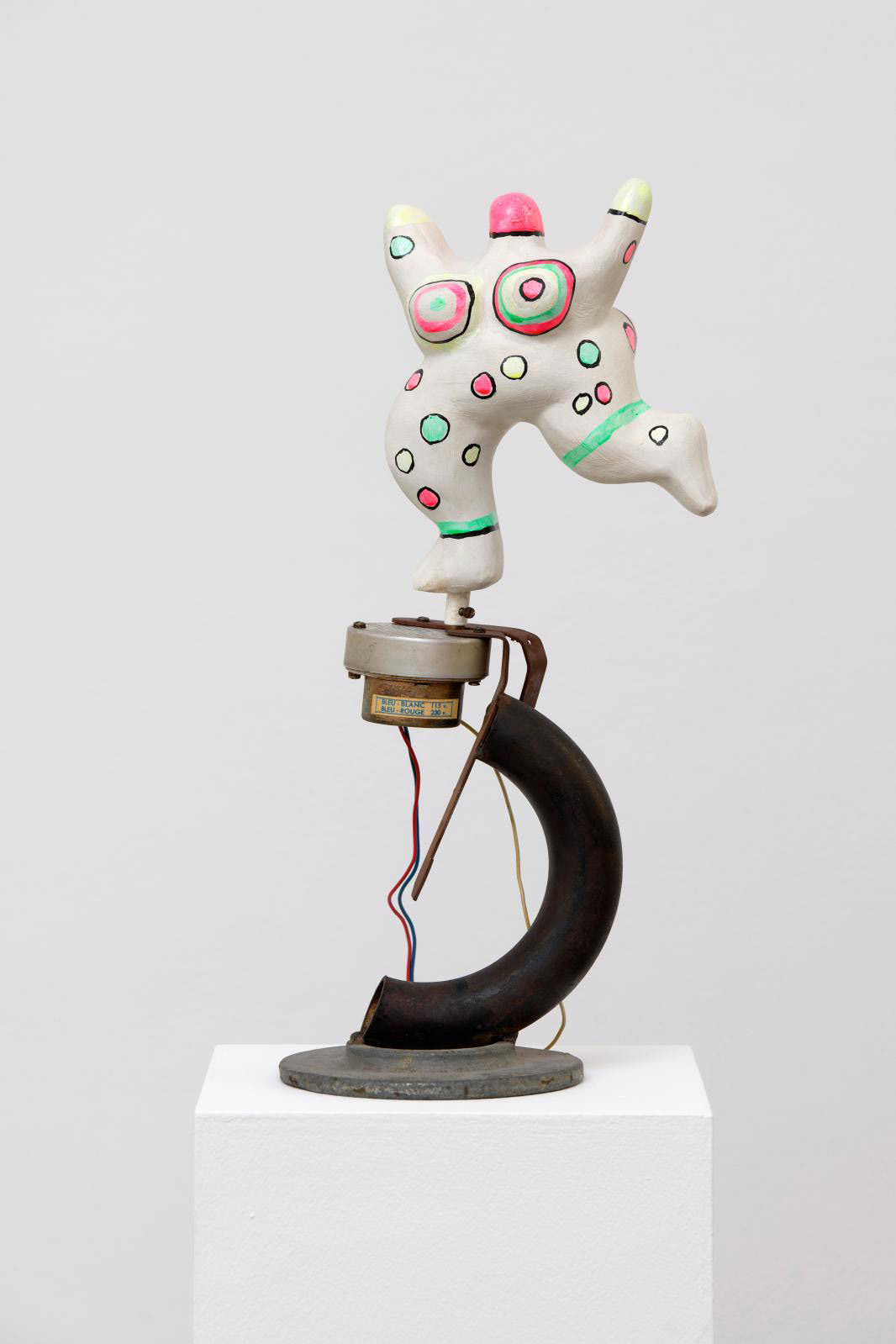 Niki de Saint Phalle (1930-2002), Nana Machine, 1976, painted polyester, iron base, electric motor by Jean Tinguely (1925-1991), 44 x 15 x 15 cm/17.32 x 5.90 x 5.90 in. © Niki Charitable Art Foundation, Courtesy Galerie Mitterrand Photo: A. Mole