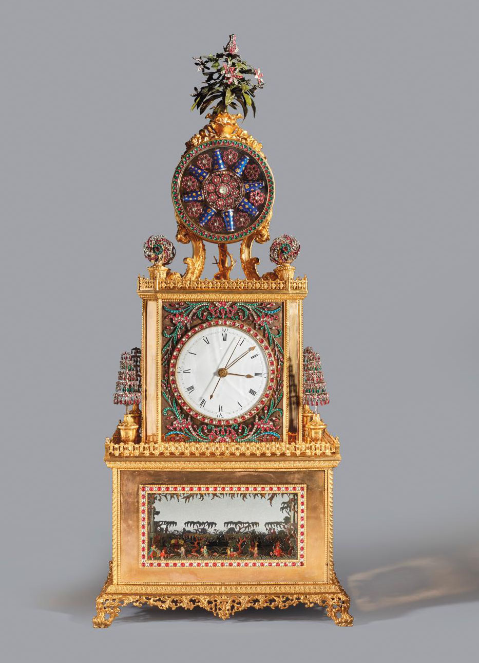 China, Qianlong era (1736-1795). Imperial automaton clock decorated with tribute bearers, gilded bronze, colored stone inlays, reverse glass painting, mirror, enamel and silk, three-melody bell mechanism, 85 x 24 x 23 cm/33.4 x 9.4 x 9 in. Estimate: €800,000/1.2 M
