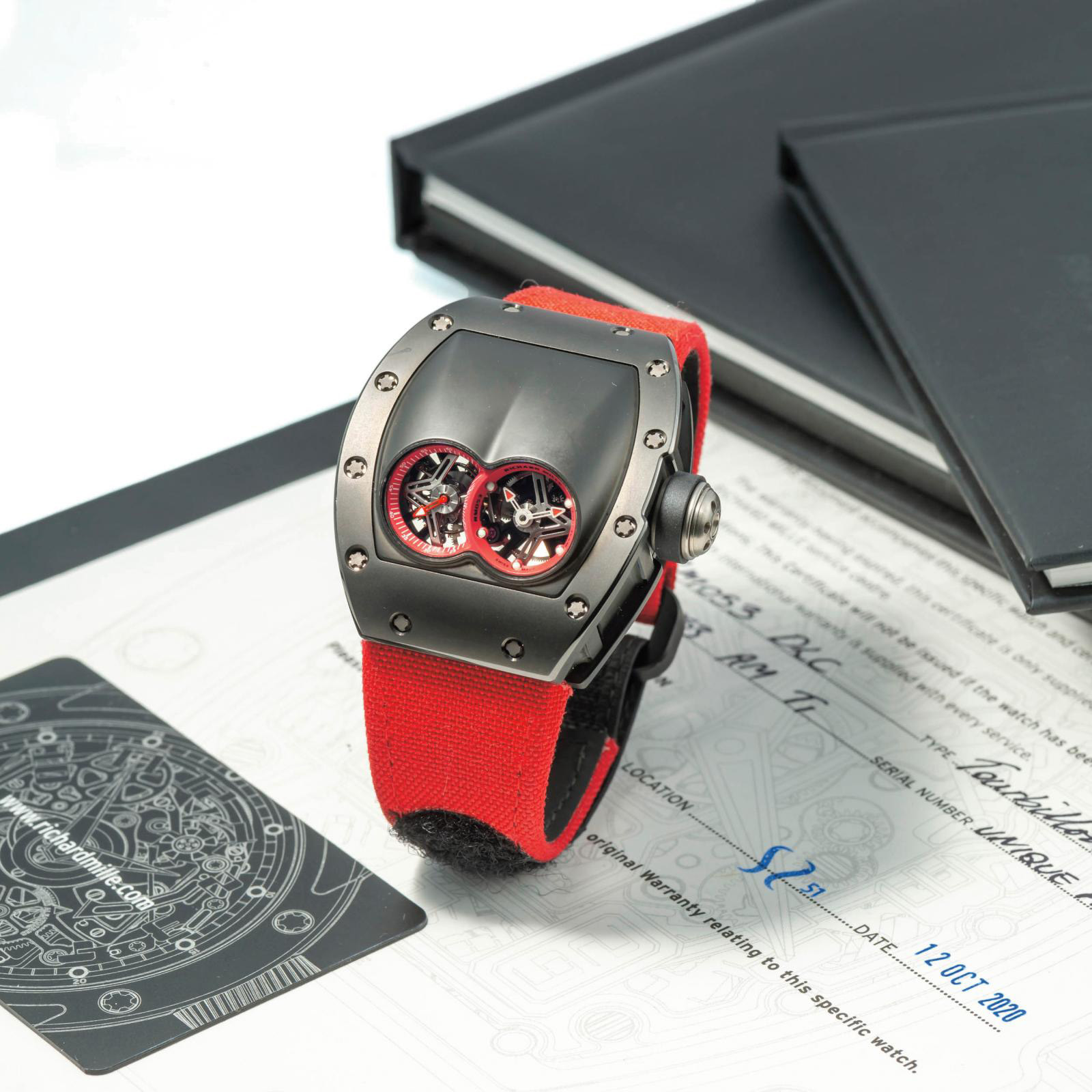 Richard Mille. Men's watch in titanium and red leather, "RM053 DLC" model, 2020, unique piece, weight: 84.2 g/2.97 oz. Estimate: €1/2 M