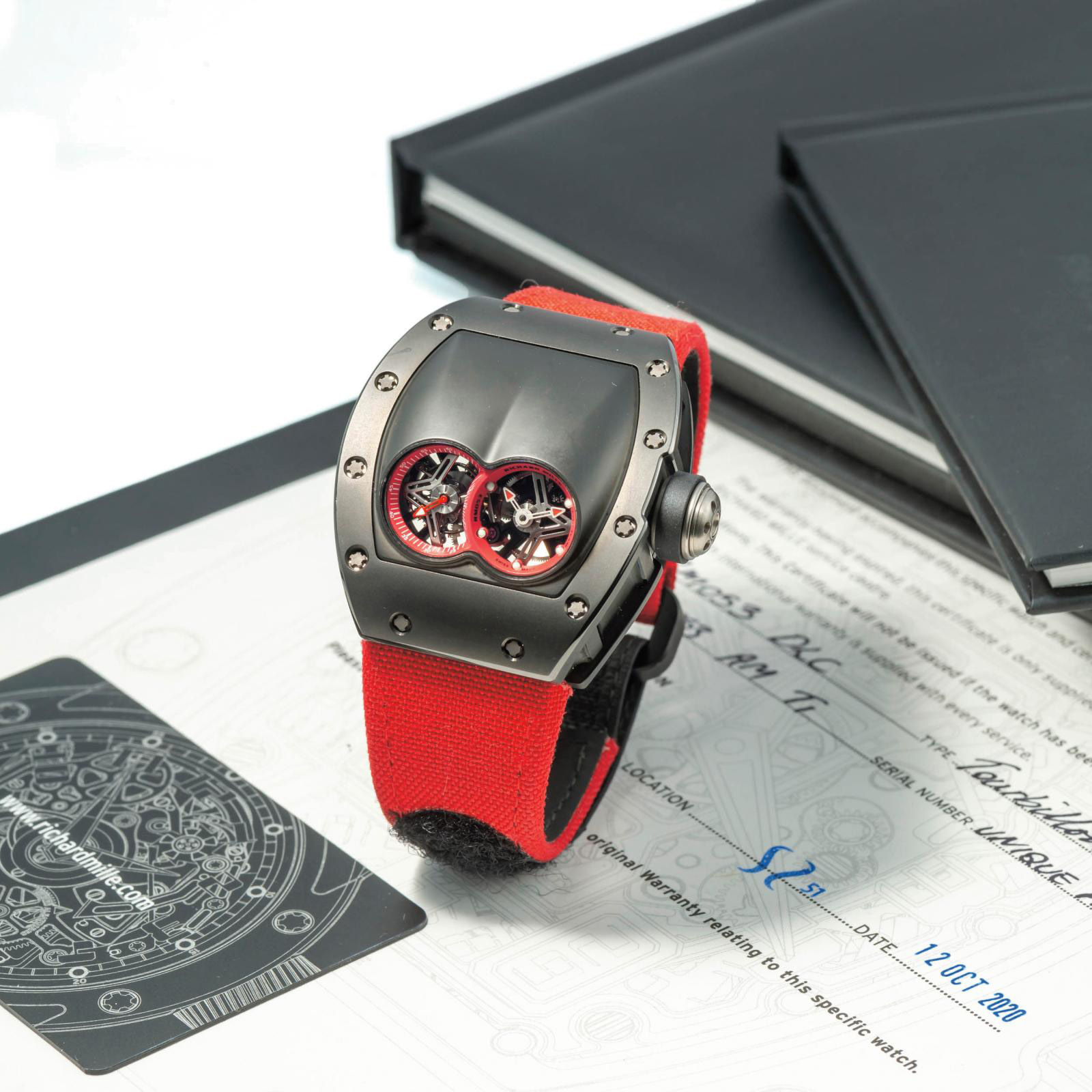 Richard Mille. Men's watch in titanium and red leather, "RM053 DLC" model, 2020, unique piece, weight: 84.2 g/2.97 oz. Estimate: €1/2 M Richard Mille. Men's watch in titanium and red leather, "RM053 DLC" model, 2020, unique piece, weight: 84.2 g/2.97 oz. Estimate: €1/2 M