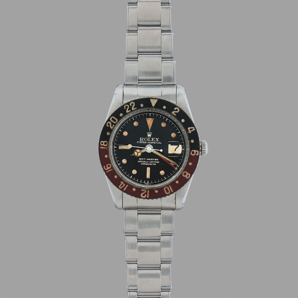 Rolex "Pussy Galore" GMT-Master, c. 1958, steel wristwatch, riveted Oyster bracelet, diam. 3.8 cm/1.5 in. Result: €112,500