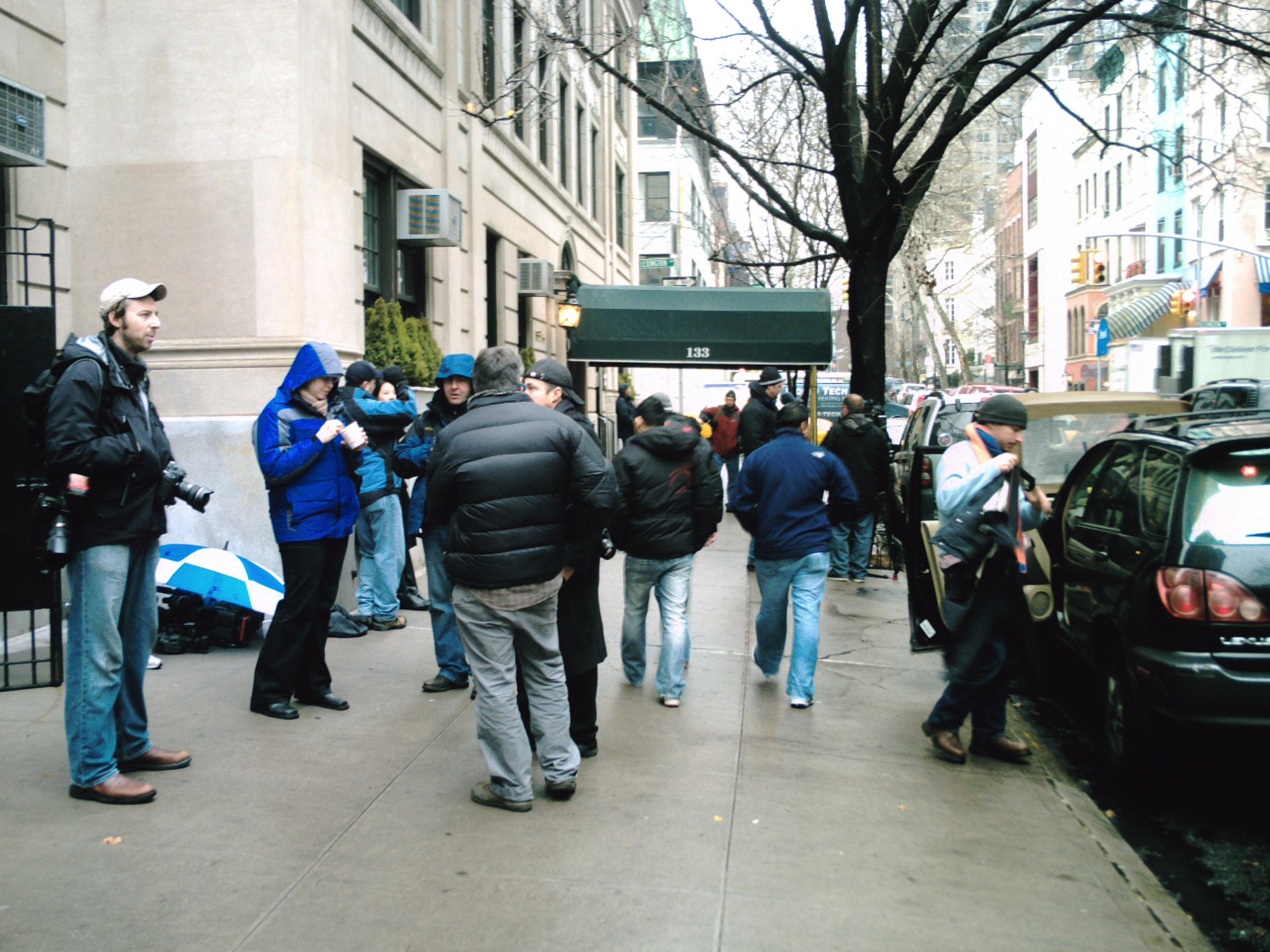 Photographers waiting outside the entrance to the apartment block where Bernard Madoff was under house arrest. Red Carlisle via flickr