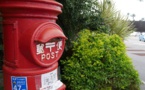 Japan may postpone Japan Post shares sale after insurance scandals