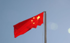 China lowers key rate to support economy under "triple pressure"