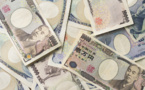 Japan's central bank raises GDP and inflation forecasts
