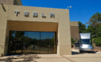 Tesla to cut at least 14% of staff this year
