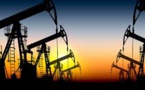 Global Glut Forces Oil Prices to Hover Around Near 11- year Lows